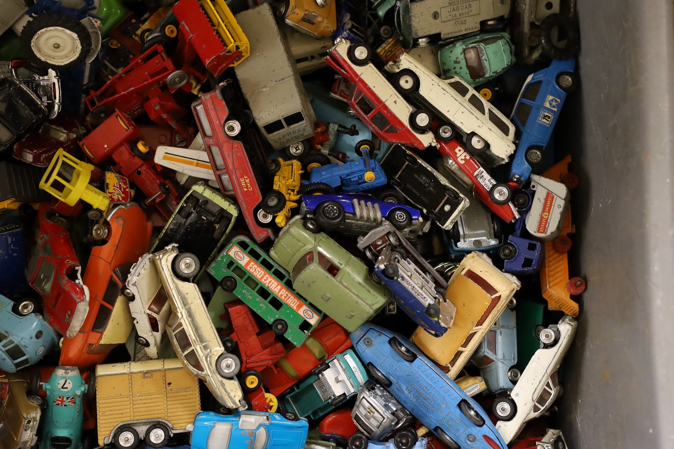 A large collection of used mixed die-cast toys